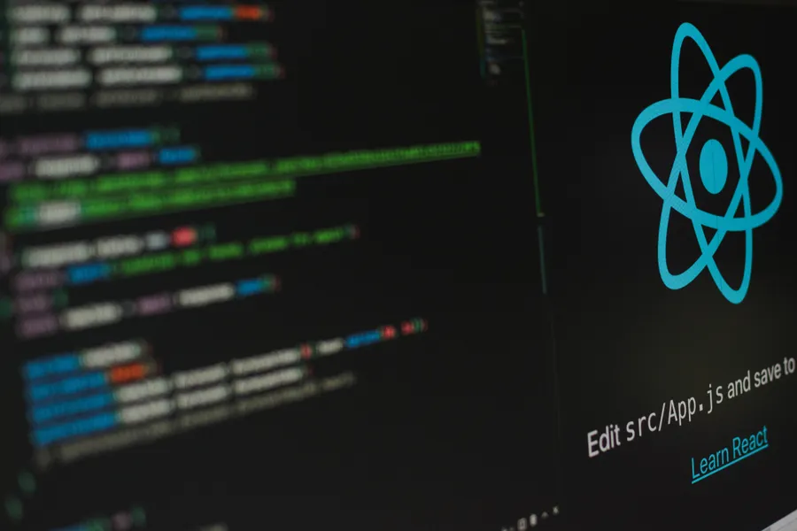 The ReactJS logo and code